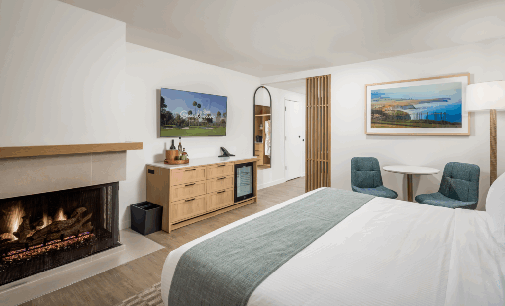 Image showcasing Accessible Golf View King Fireplace | Guesthouse