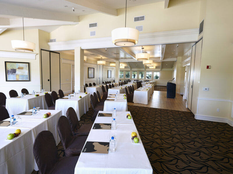 conference room setup with tables and chairs